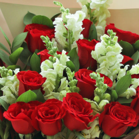 Blooming Rose with Water Orchid Hand Bouquet