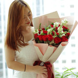 Blooming Rose with Water Orchid Hand Bouquet